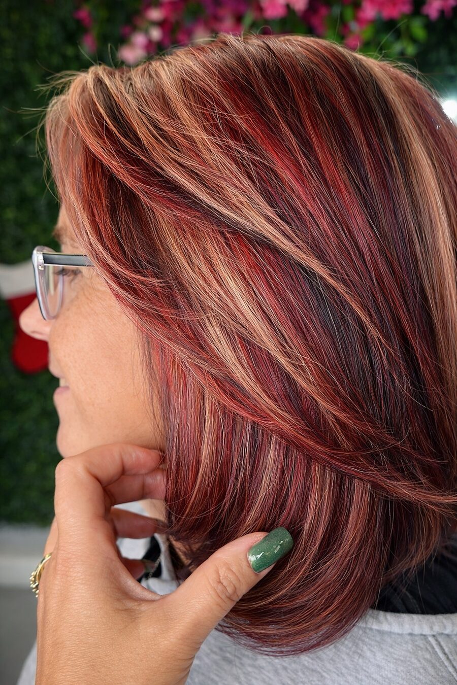 Bob with copper and red highlights, seen from the side